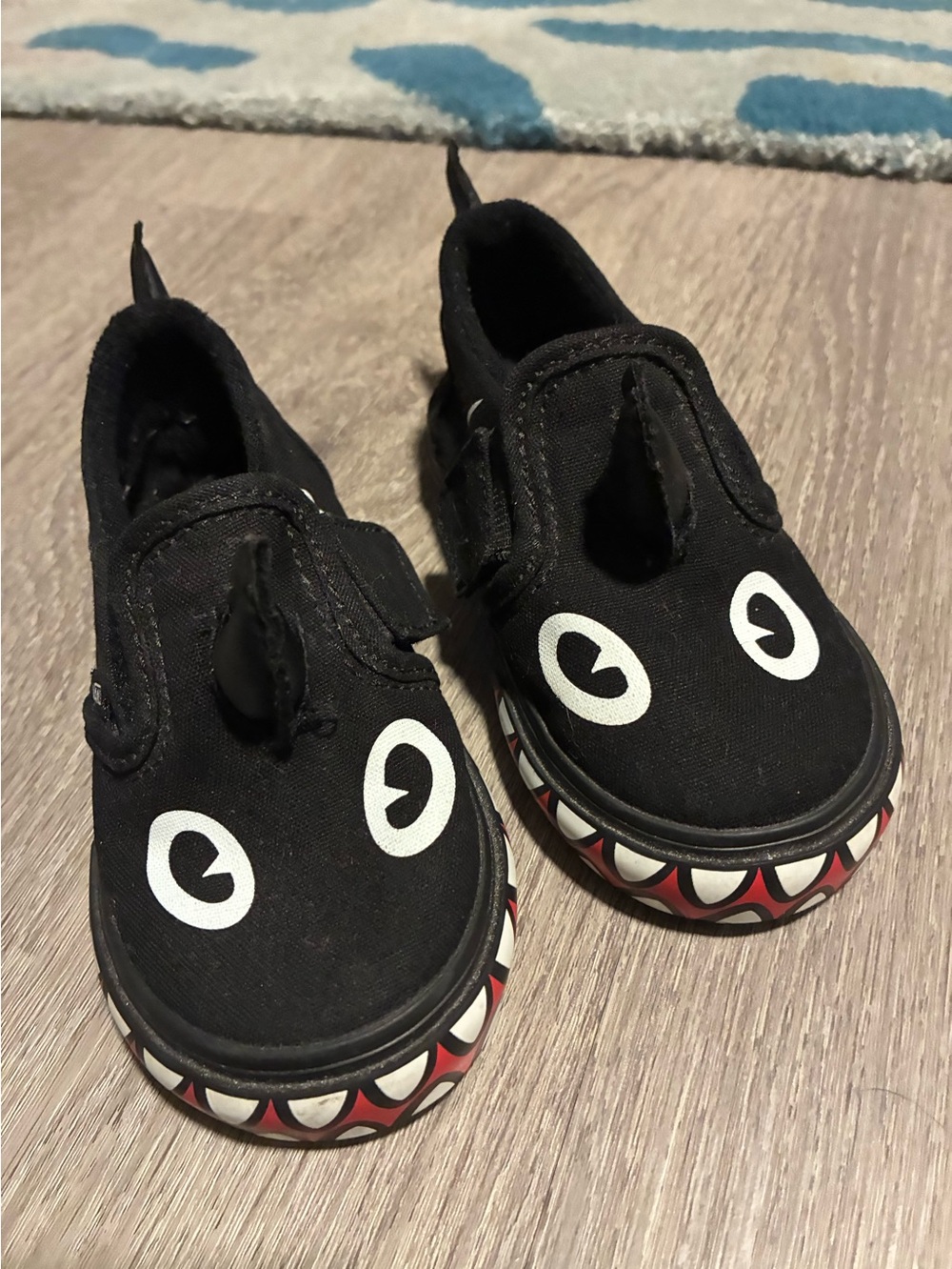 Vans Kids Black Shark Slip-On Shoes with Playful Eyes